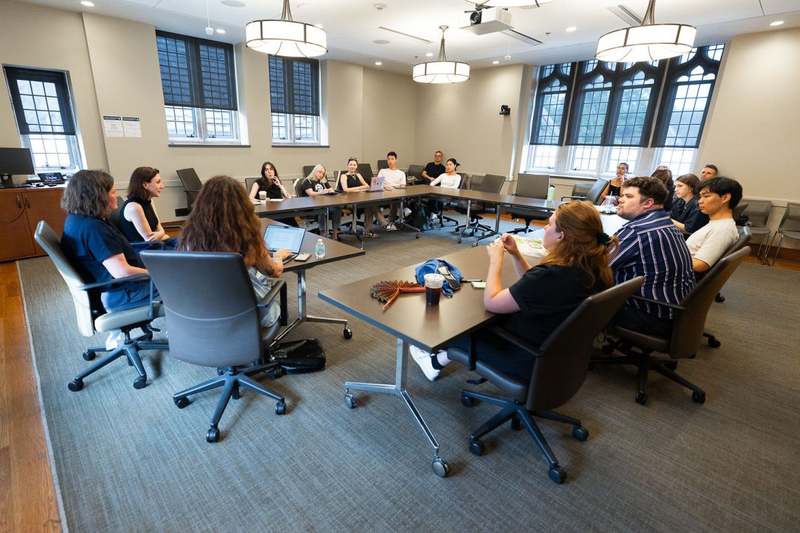 picture of a group of people sitting around the table from Anne Pauly event